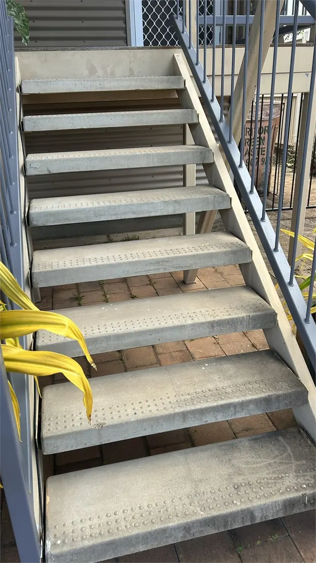 Stairs before pressure washing
